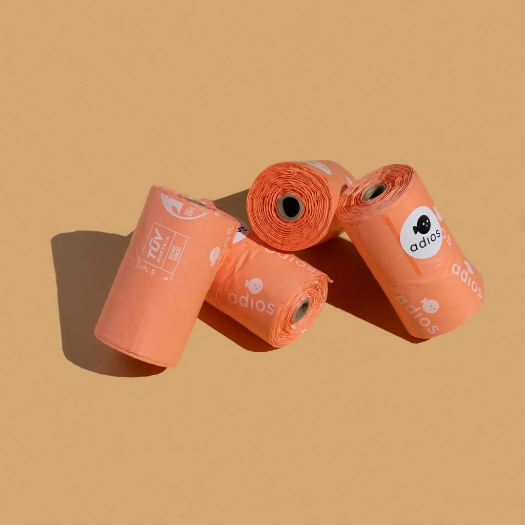 Adios Compostable Poop Bags with Handles On a Roll (Pink)
