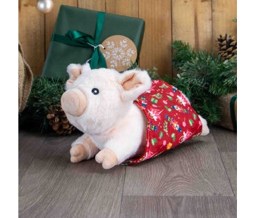 Ancol Paloma Pig in Blanket plush dog toy with a pale pink snout and ears and a red Christmas-patterned blanket around its cream body.